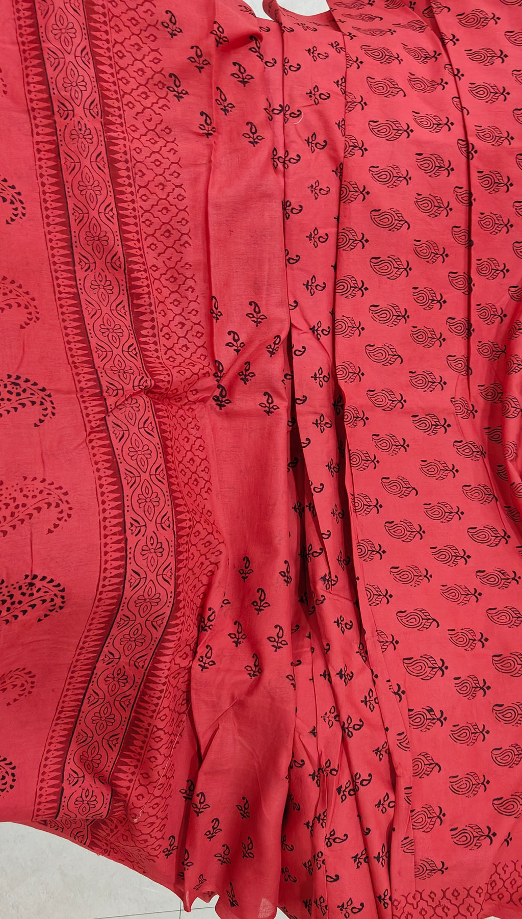 Traditional Dhar Bagh hand block print unstitched suit set in pure cotton, featuring intricate red and black handmade motifs with a matching dupatta