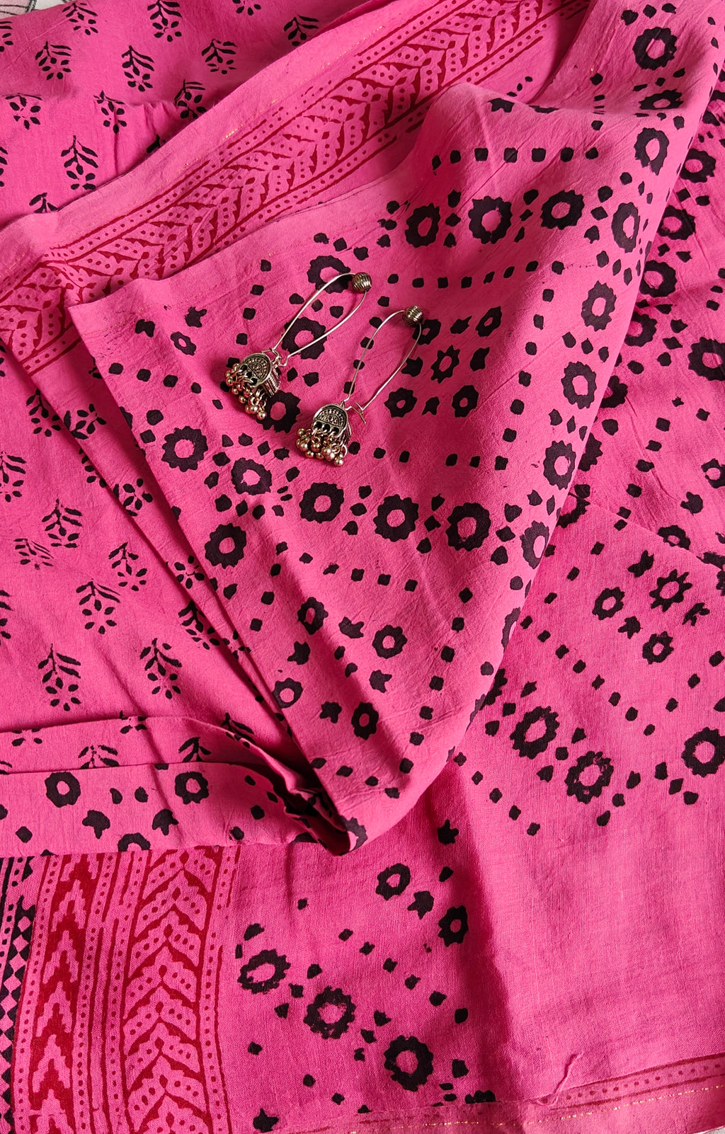 Traditional Dhar Bagh hand block print unstitched suit set in pure cotton featuring pink handmade motifs and a matching dupatta.