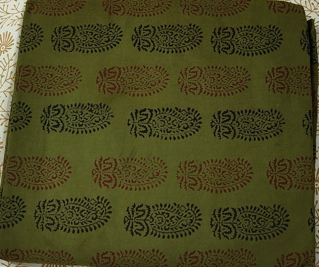Traditional green Dhar Bagh hand block print unstitched suit set in pure cotton with handmade motifs and matching dupatta.