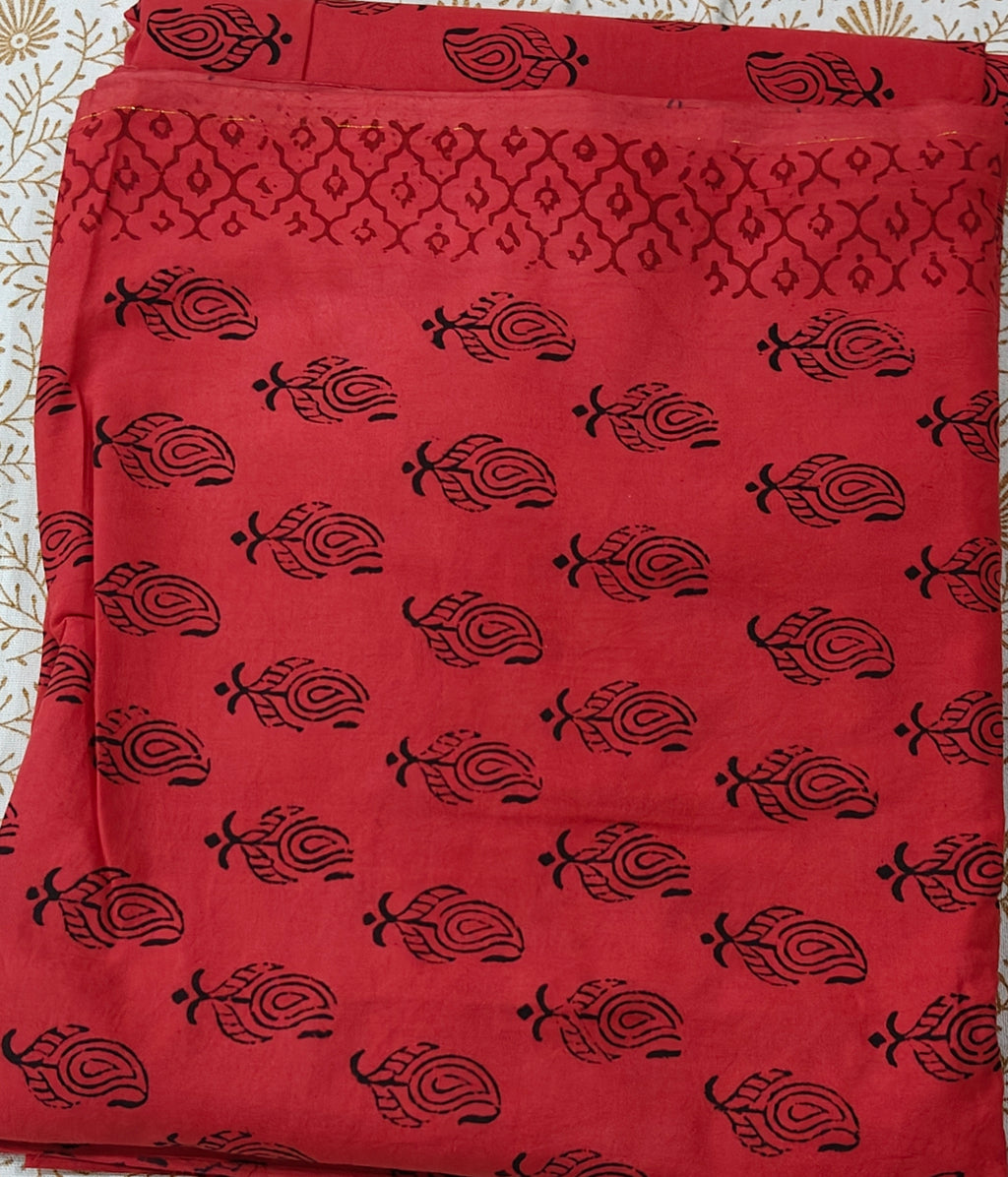 Traditional Dhar Bagh hand block print unstitched suit set in pure cotton, featuring intricate red and black handmade motifs with a matching dupatta