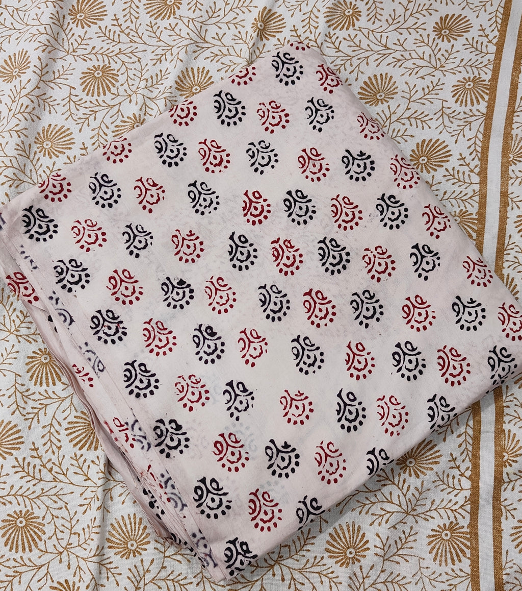 Traditional_white_Dhar_Bagh_hand_block_print_unstitched_suit_set_in_pure_cotton_with_handmade_motifs_and_matching_dupatta