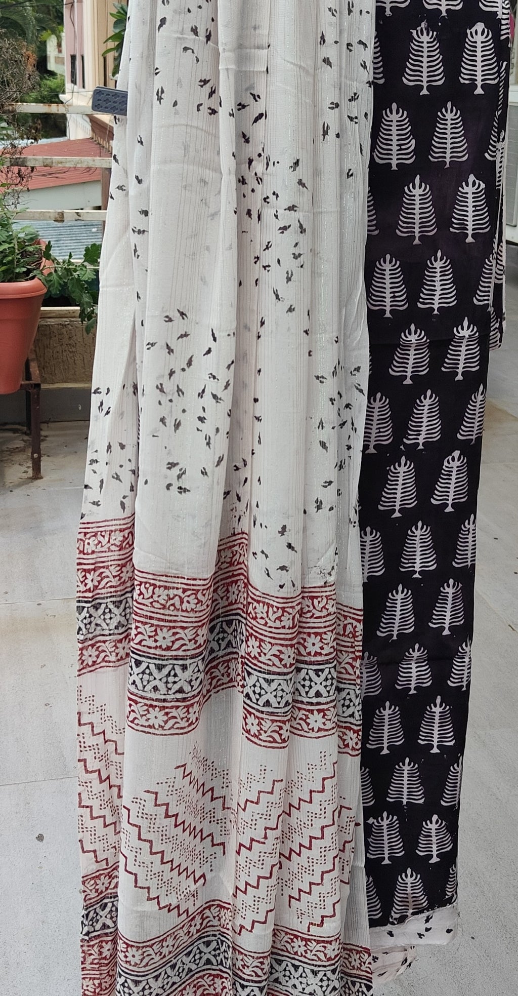 Artisan Made Dhar  White Bagh block print on black fine muslin unstitched suit with  contrast chiffon dupatta.