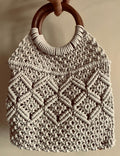Large handmade macrame handbag in natural cream cotton featuring sturdy wooden handles
