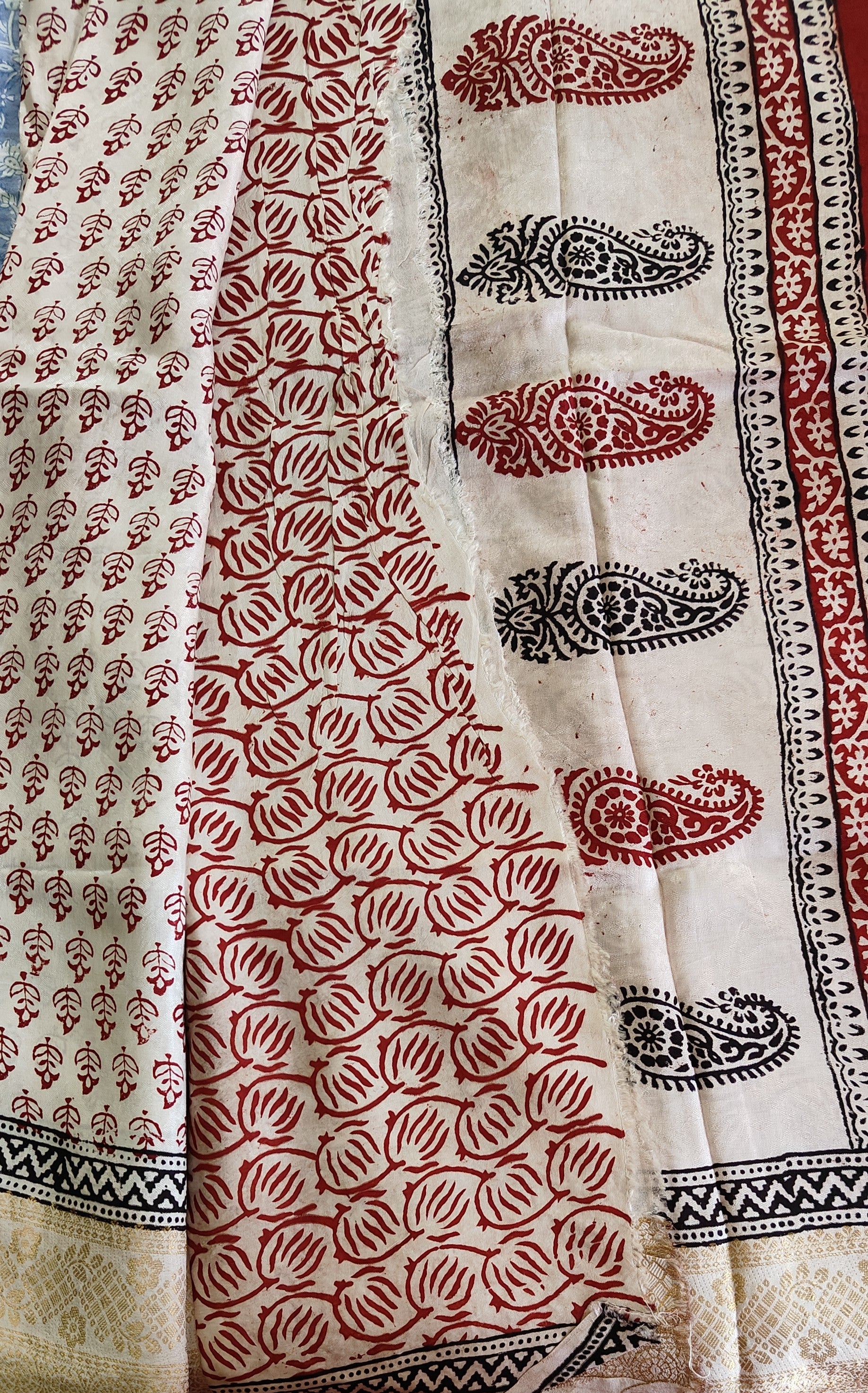 Artisan made wooden block prints on a Dola silk Saree, showcasing 