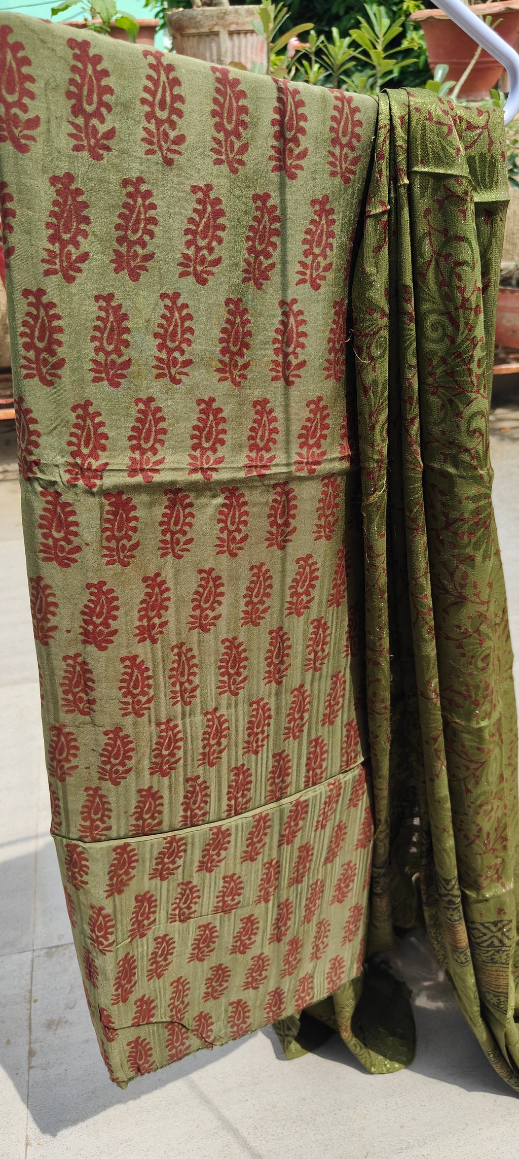 Authentic Dhar Bagh red block print on fine green muslin unstitched suit with a coordinating chiffon dupatta.