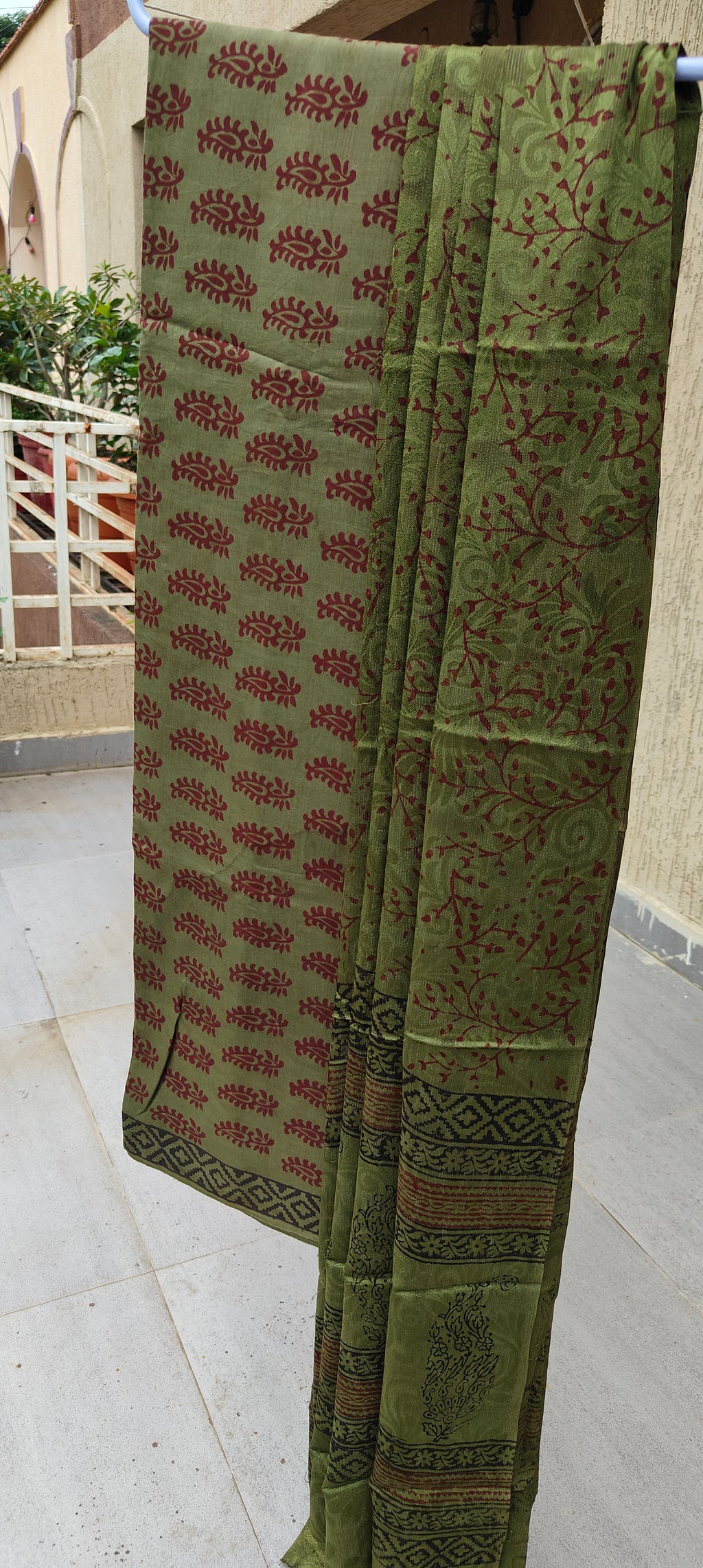 Authentic Dhar Bagh red block print on fine green muslin unstitched suit with a coordinating chiffon dupatta.