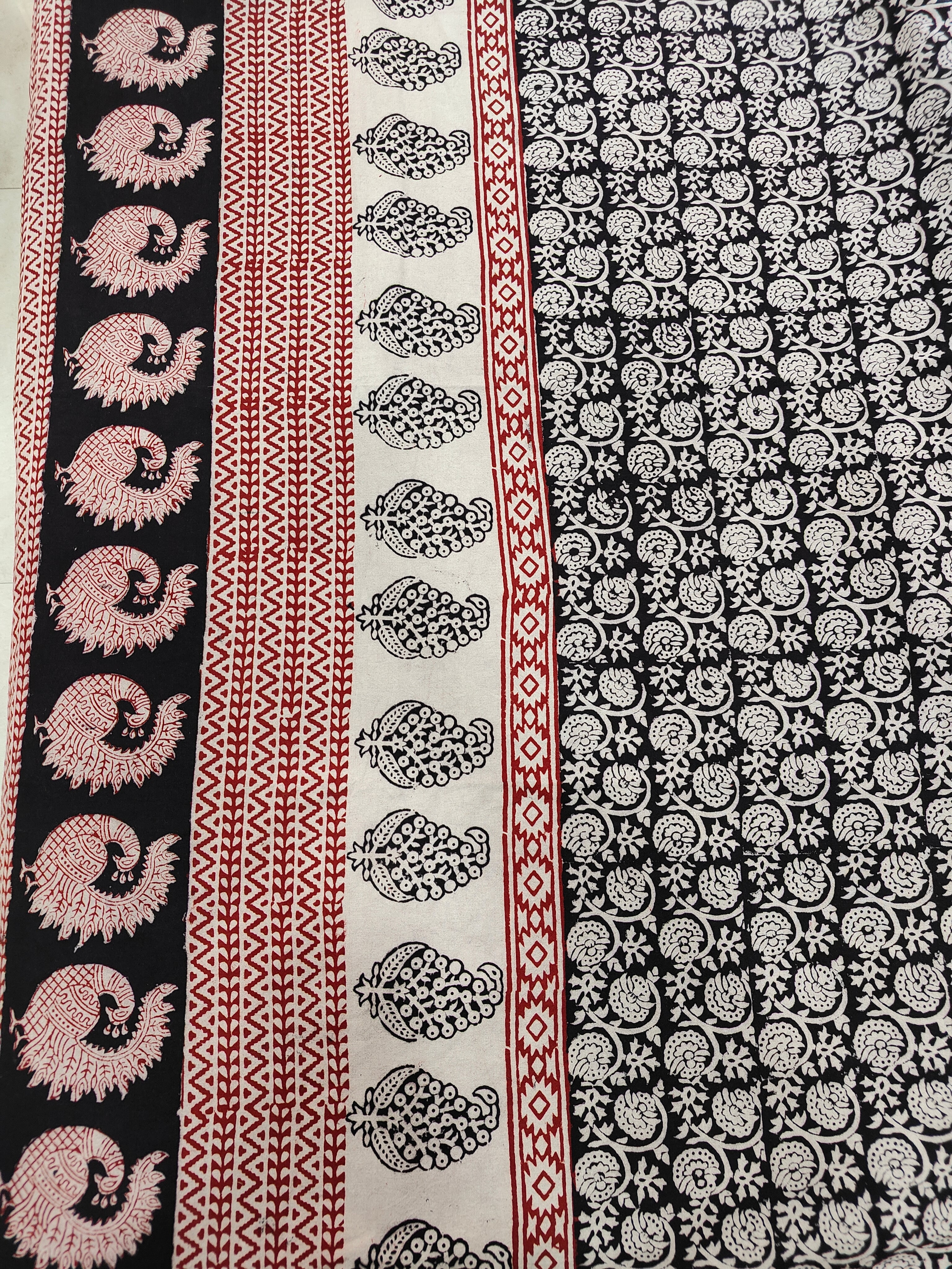 Set of handmade Bagh block print in traditional black, offwhite and madder red  creeper flower patterns with peacock shape bold border bedsheet with pillow covers.