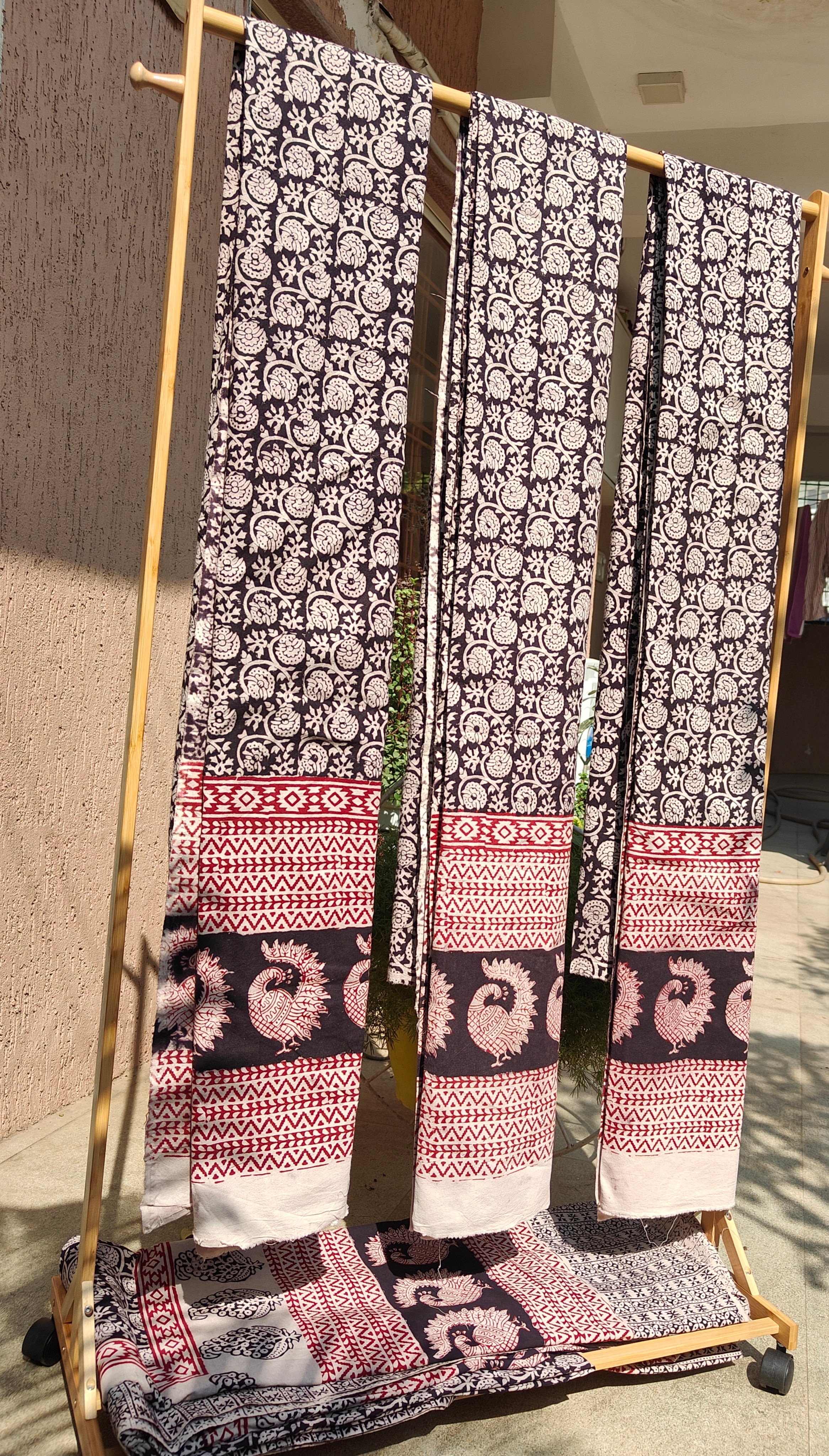 Set of handmade Bagh block print in traditional black,offwhite and madder red  creeper flower patterns with peacock shape bold border three curtains.