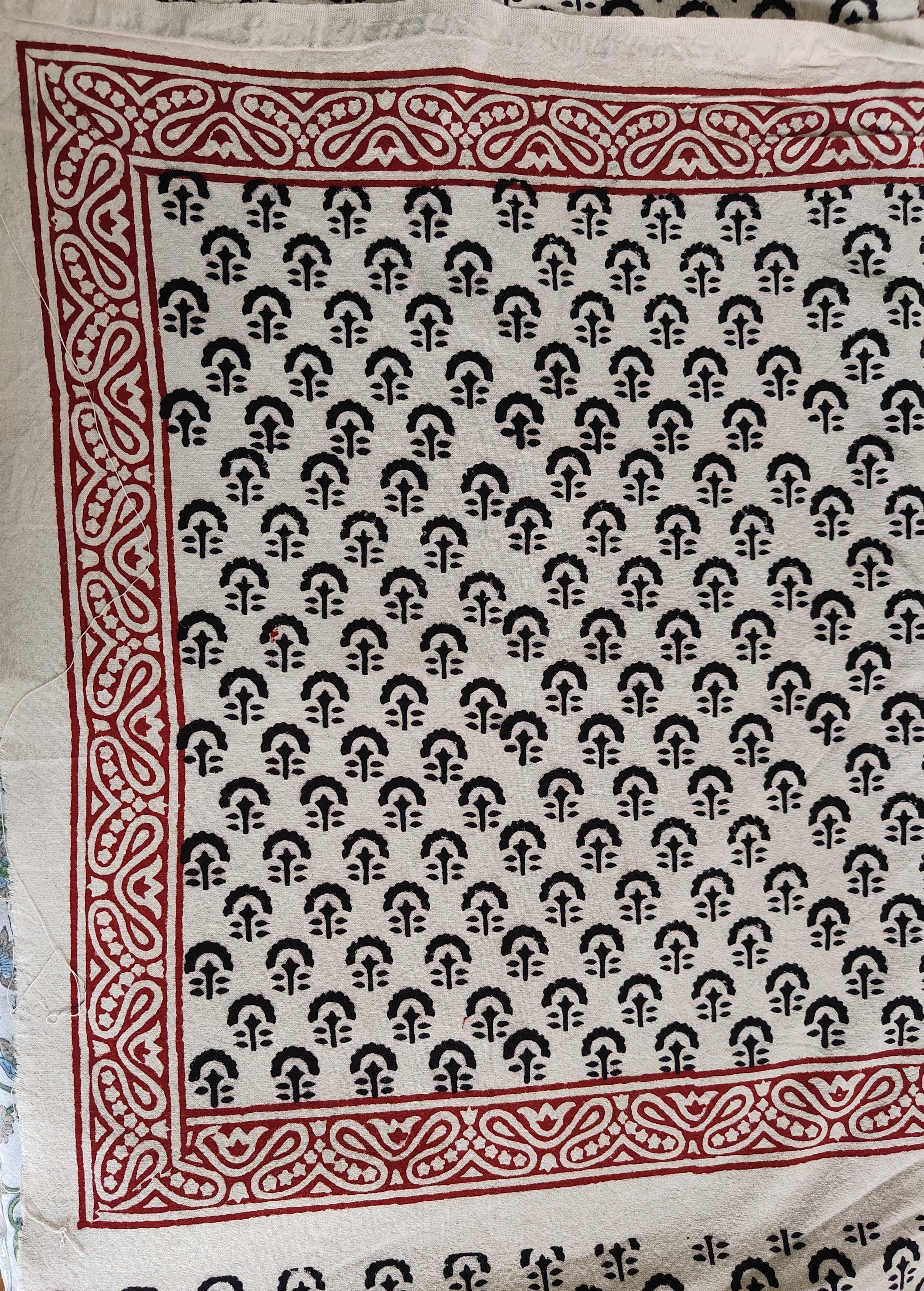 Set of handmade Bagh block print in traditional offwhite with black tree block and madder red pattern with big leaf bold border bedsheet with pillow covers