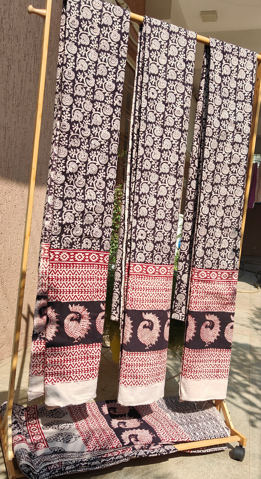 Set of handmade Bagh block print in traditional black,offwhite and madder red  creeper flower patterns with peacock shape bold border three curtains.