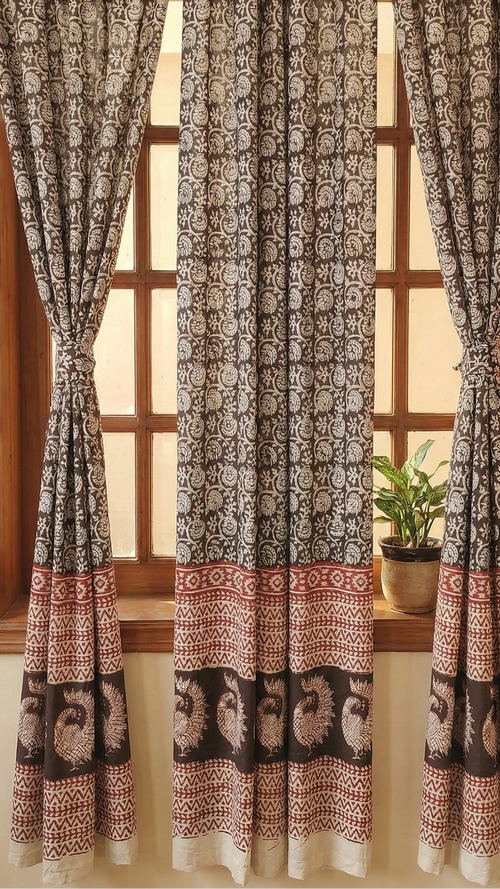 Set of handmade Bagh block print in traditional black,offwhite and madder red  creeper flower patterns with peacock shape bold border three curtains on a classic window