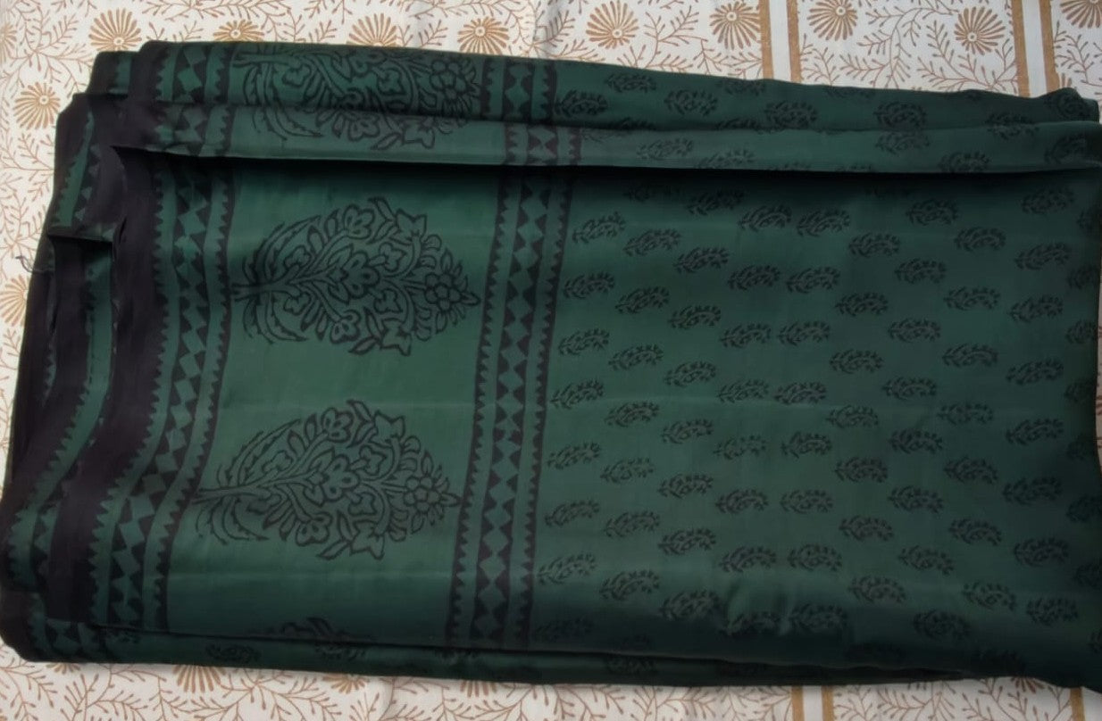 Dhar Bagh print Dark green modal silk saree with intricate patterns