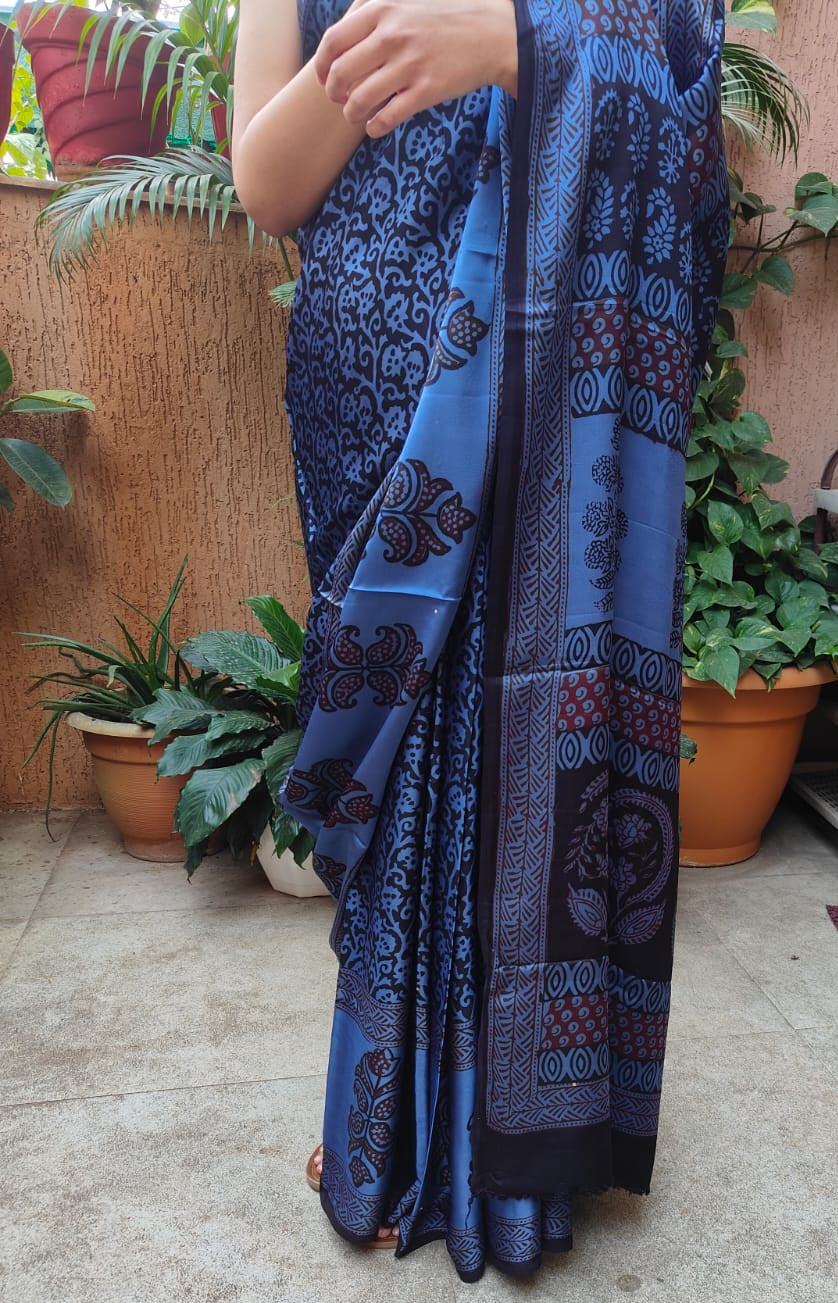 Sustainable luxury Modal silk saree featuring traditional handmade Bagh block prints in rich blue and black