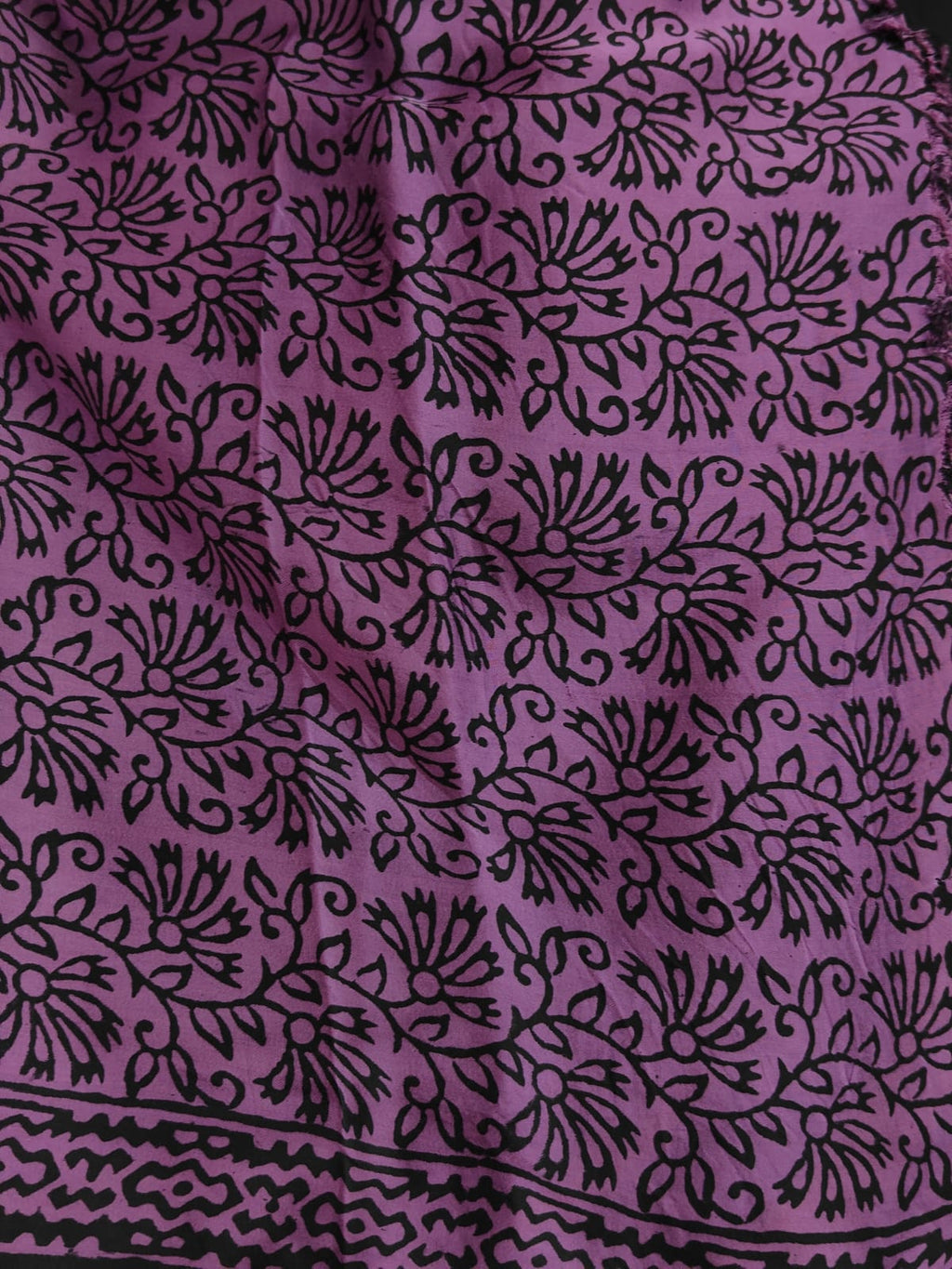 Sustainable luxury Modal silk saree featuring traditional handmade Bagh block prints in rich purple and black