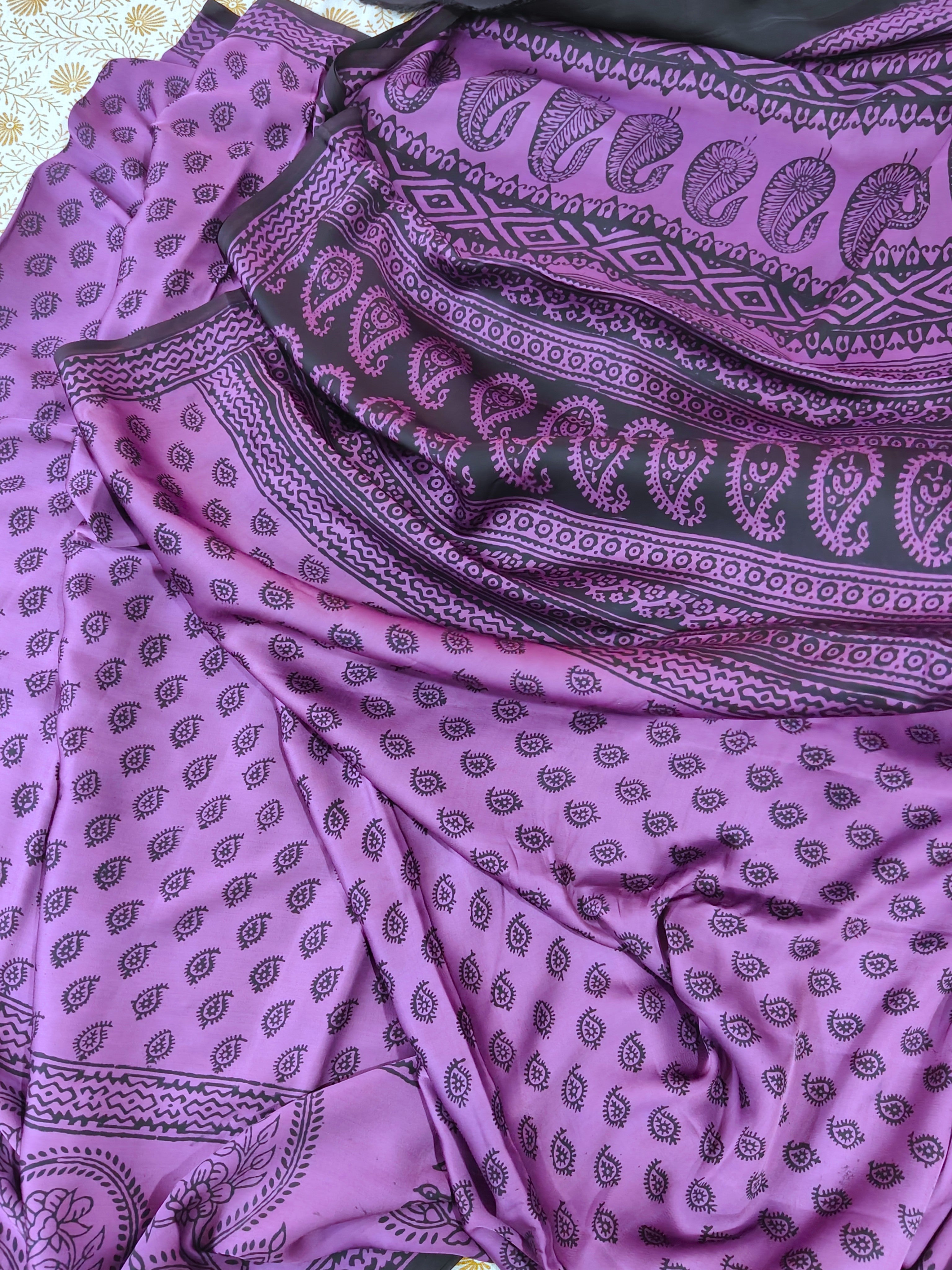 Sustainable luxury Modal silk saree featuring traditional handmade Bagh block prints in rich purple and black