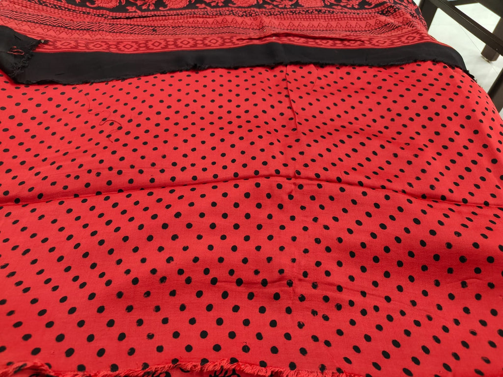 bagh block prints on a Modal silk saree, showcasing traditional Bagh floral motifs on red background