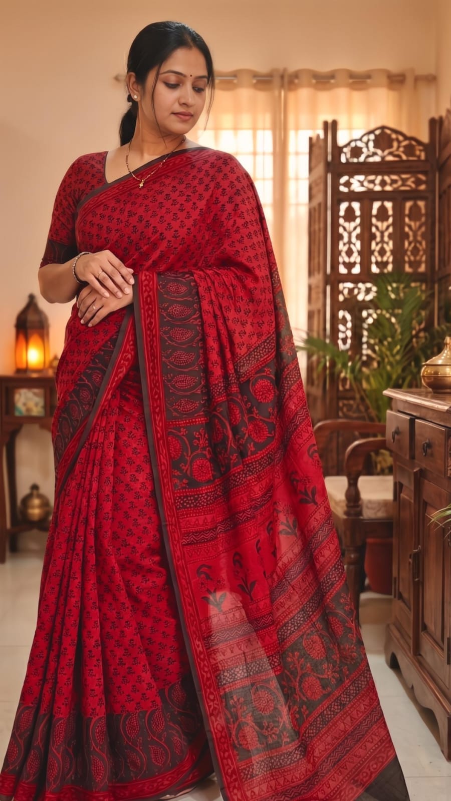 bagh block prints on a Modal silk saree, showcasing traditional Bagh floral motifs on red background
