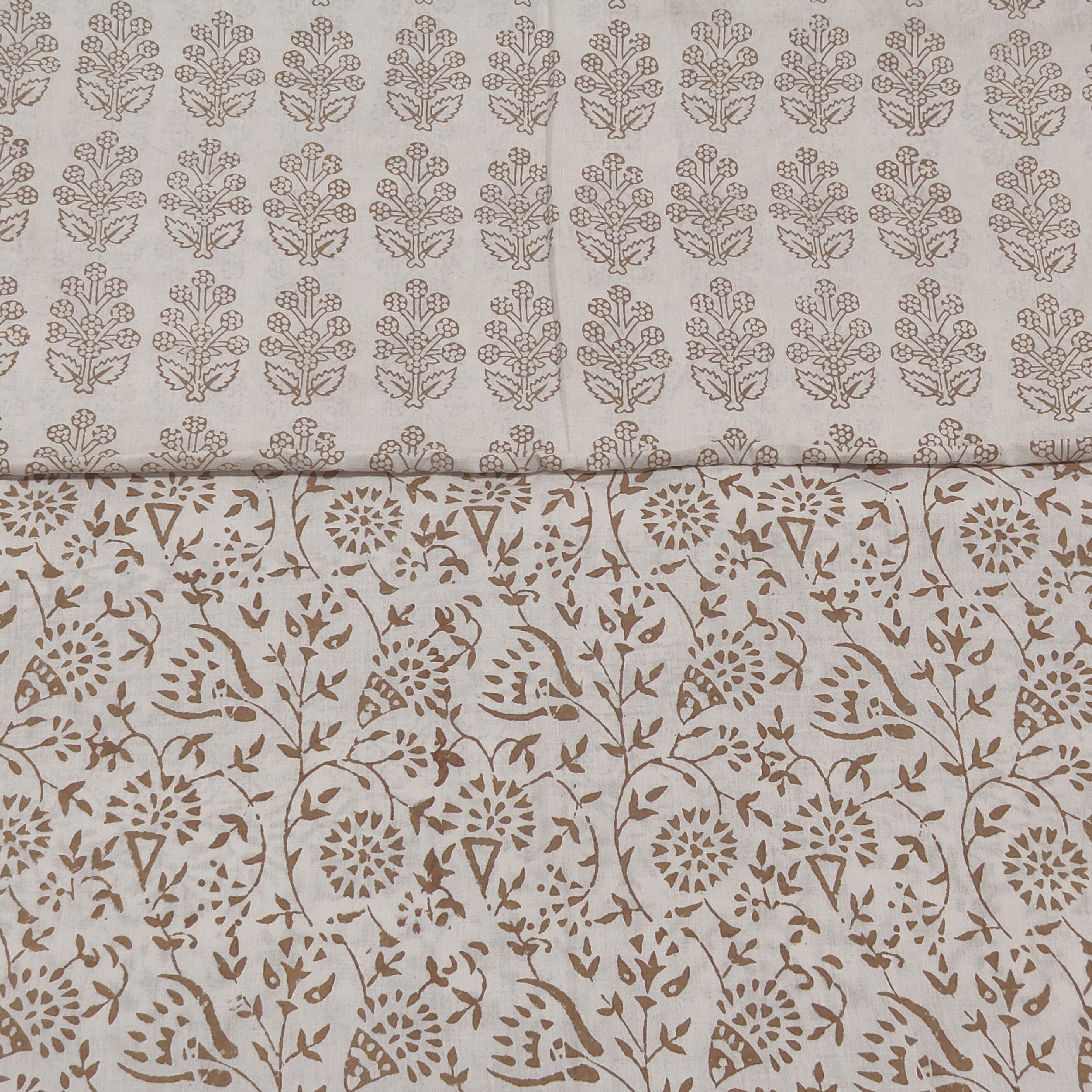 Traditional Dhar Bagh block print on off-white pure cotton fabric; copper-colored handmade big leaf motifs on an unstitched suit set with dupatta