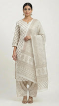 Traditional Dhar Bagh block print on off-white pure cotton fabric; copper-colored handmade circular motifs on an unstitched suit set with dupatta