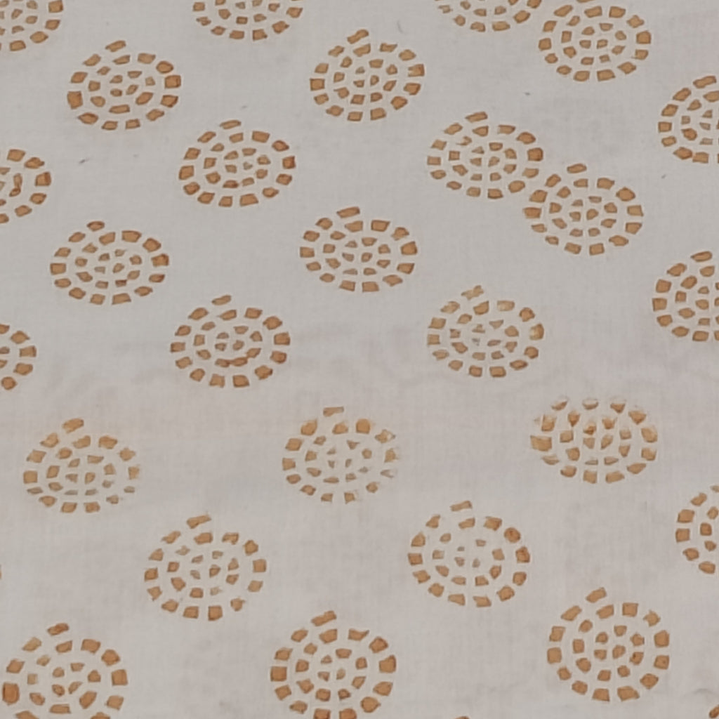 Traditional Dhar Bagh block print on off-white pure cotton fabric; copper-colored handmade circular  motifs on an unstitched suit set with dupatta