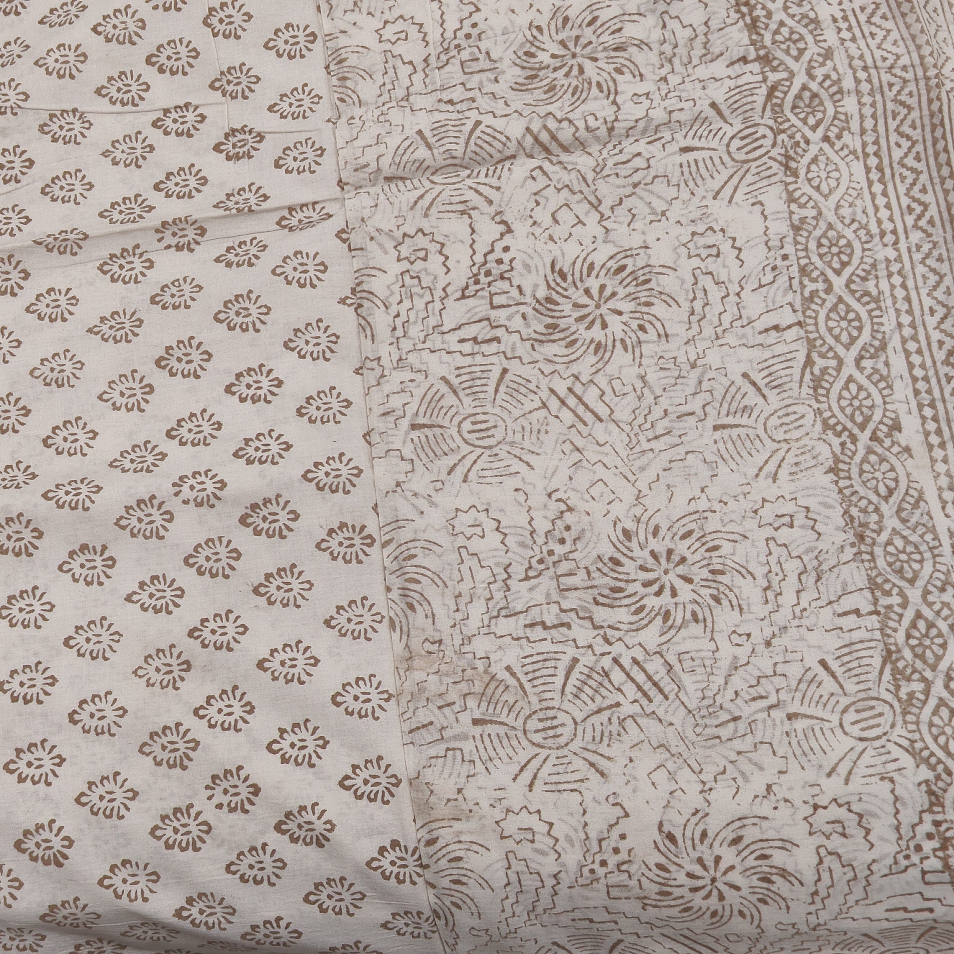 Traditional Dhar Bagh block print on off-white pure cotton fabric; grey-colored handmade small leaf motifs on an unstitched suit set with dupatta