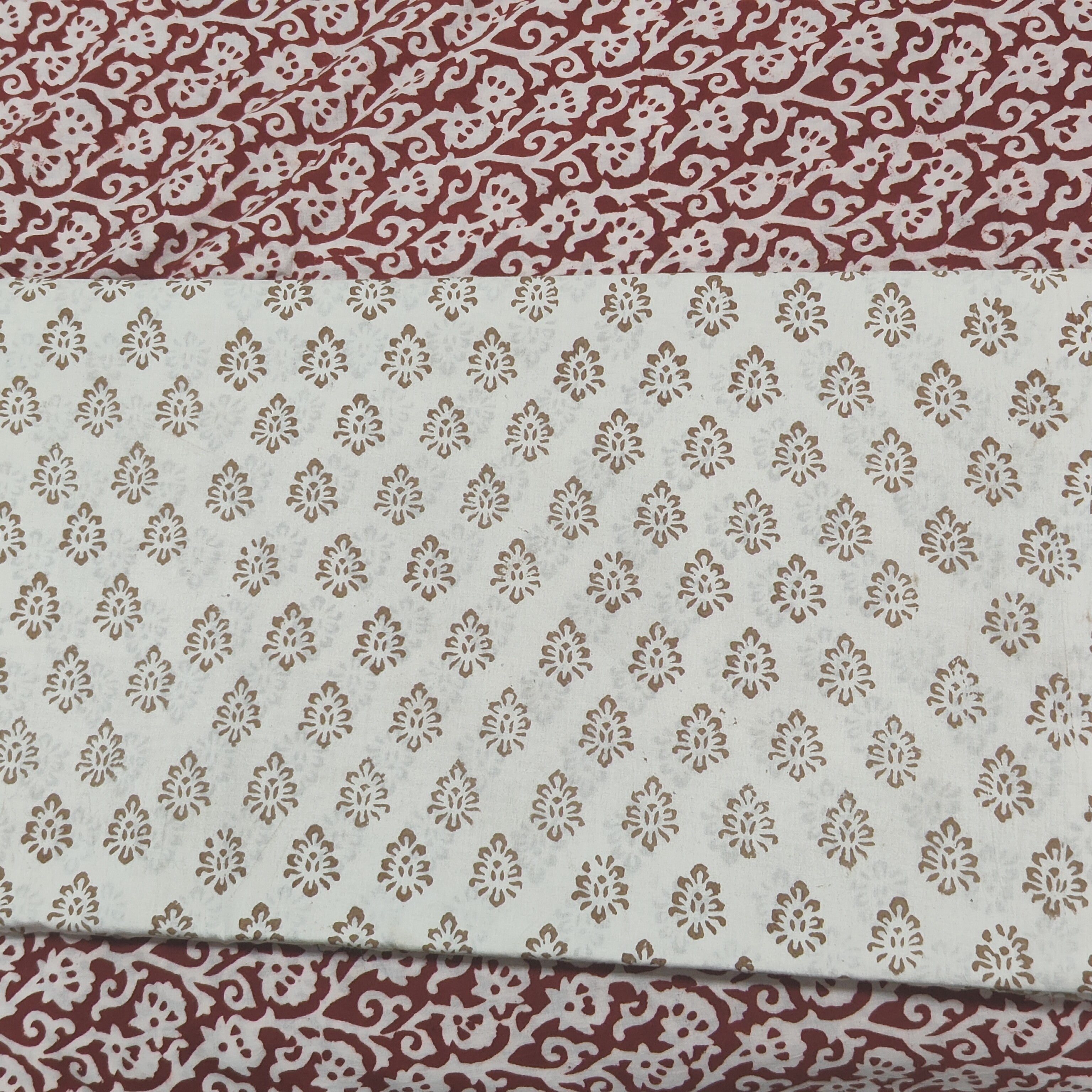 Traditional Dhar Bagh block print on off-white pure cotton fabric; grey-colored handmade small leaf motifs on an unstitched suit set with dupatta