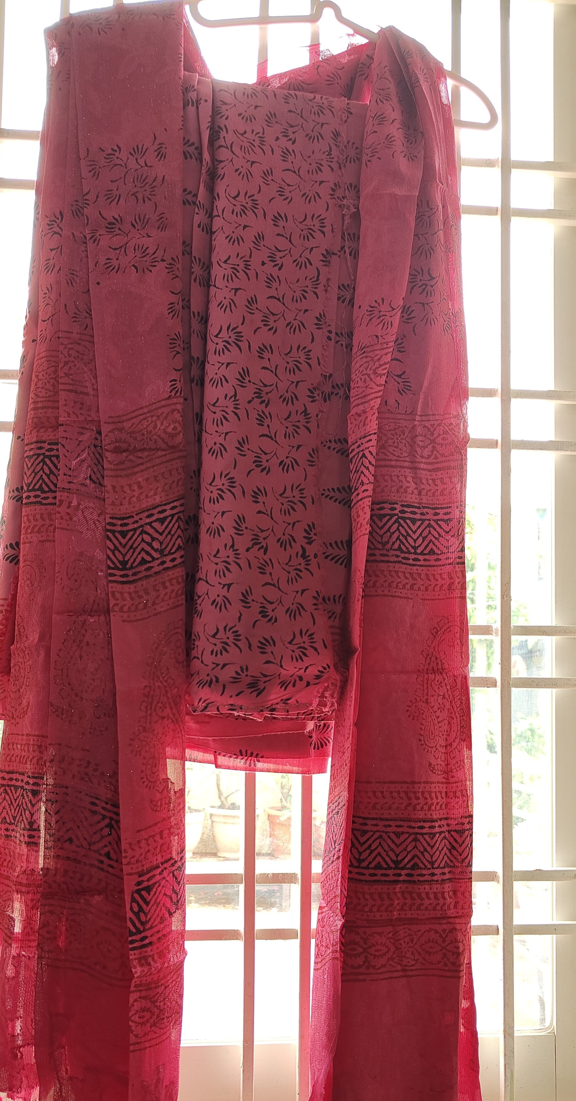 Authentic Dhar Bagh black block print on pink  fine muslin unstitched suit with a coordinating chiffon dupatta