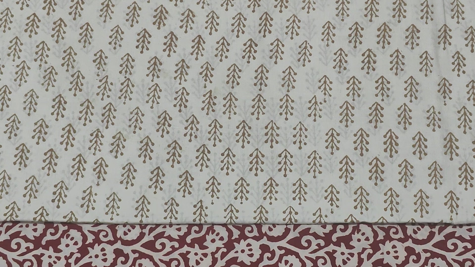 Traditional Dhar Bagh block print on off-white pure cotton fabric; copper-colored handmade palm motifs on an unstitched suit set with dupatta
