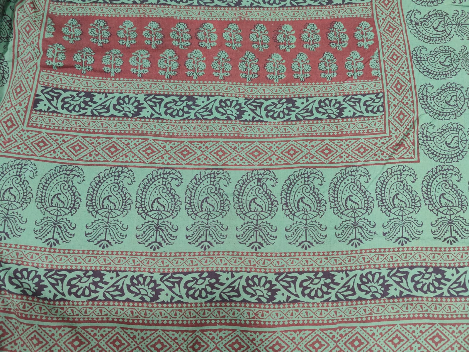 Bagh Block handmade cotton fabric for suite  dupatta with green design on a red background