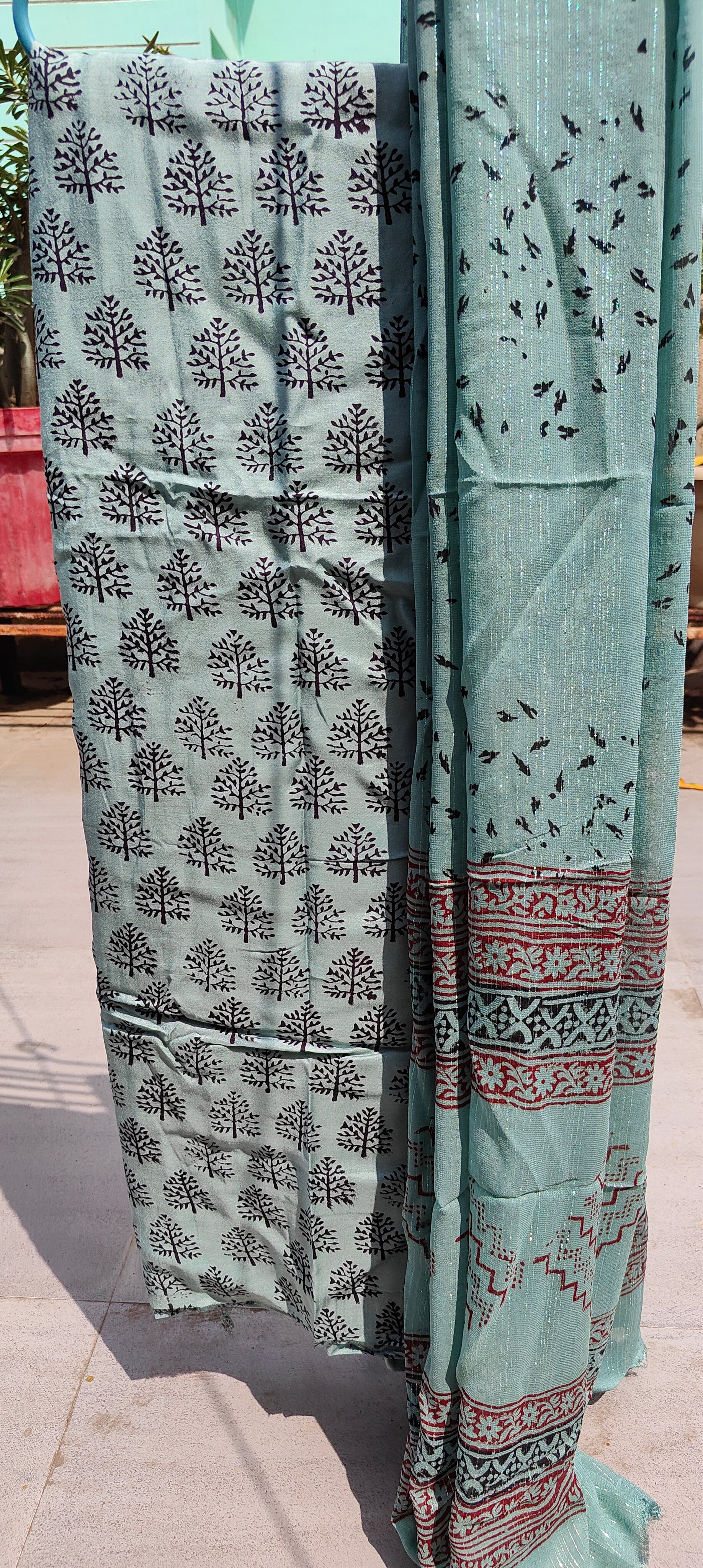 Authentic Dhar Bagh block print on fine muslin unstitched suit with a coordinating chiffon dupatta.