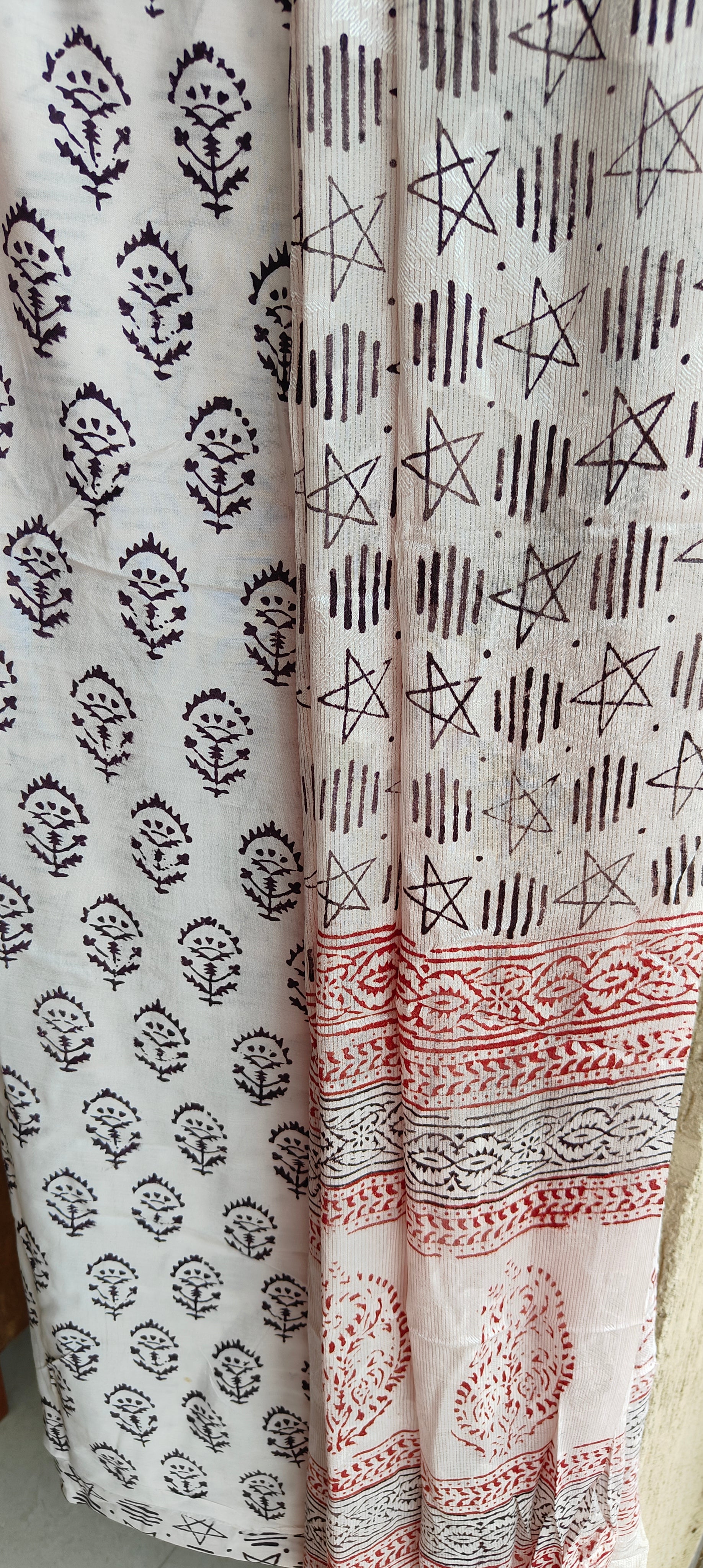 Authentic Dhar Bagh black block print on fine white muslin unstitched suit with a coordinating chiffon dupatta.